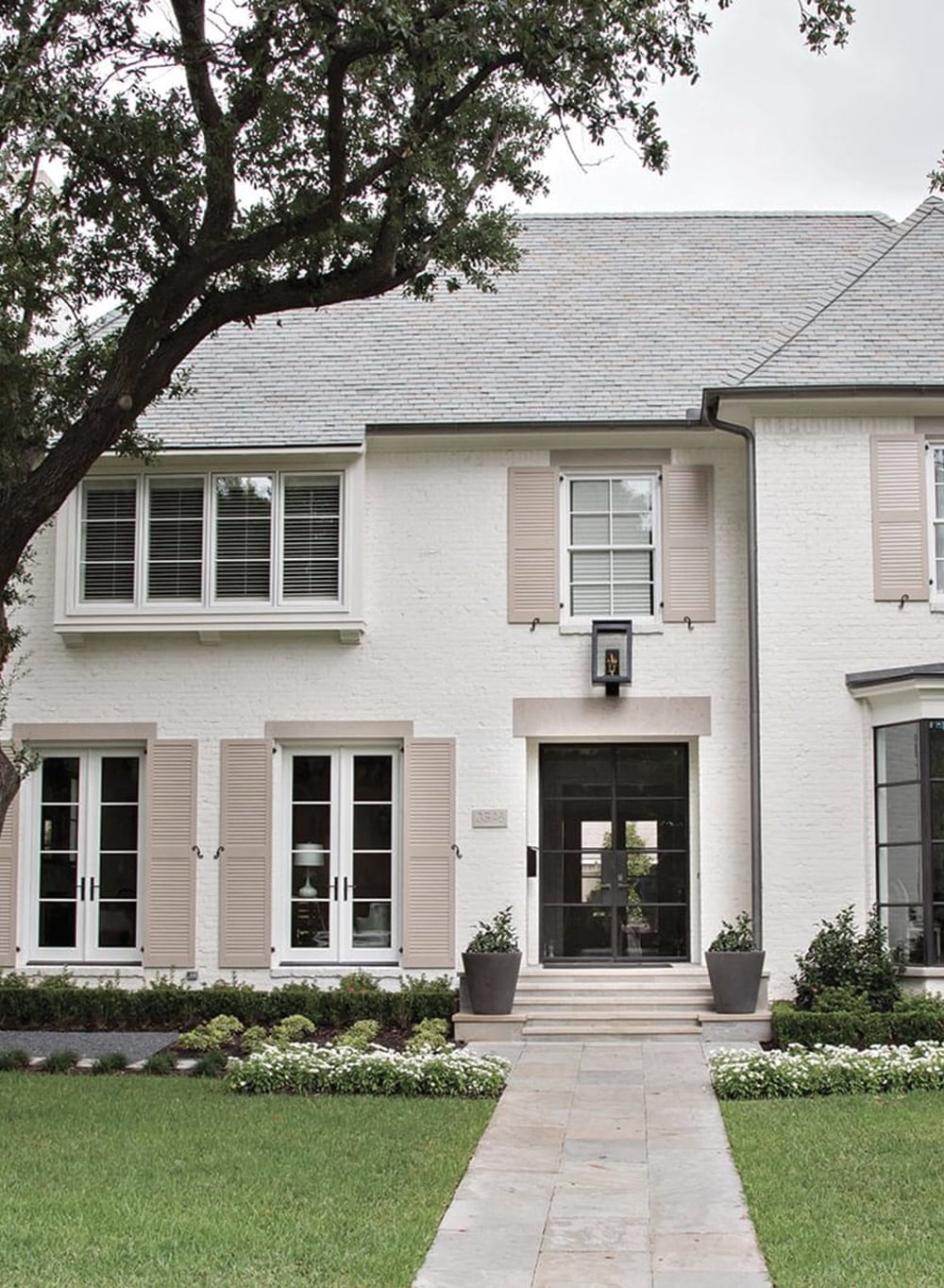 Bright painted home exterior with coordinated color palette